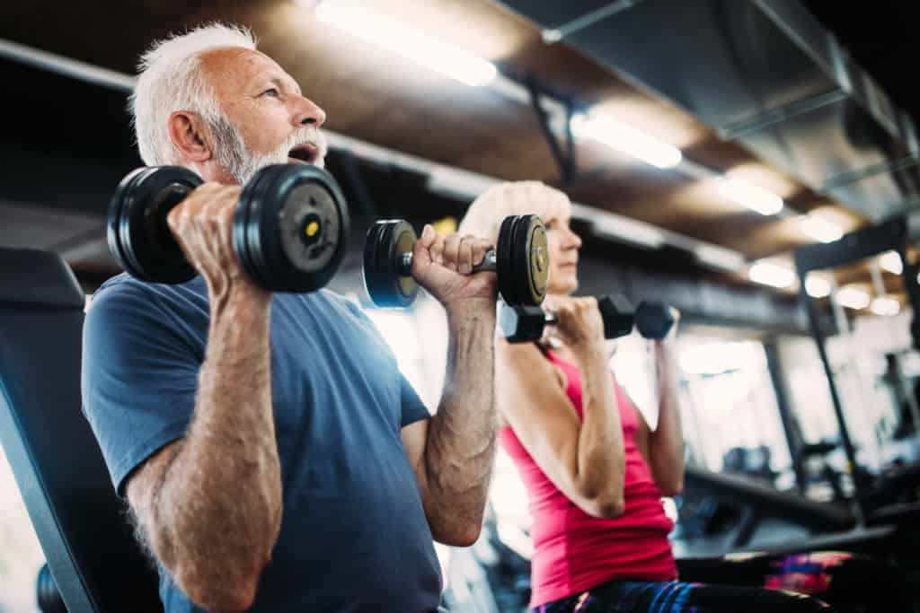 Older Couple Lifting Weights