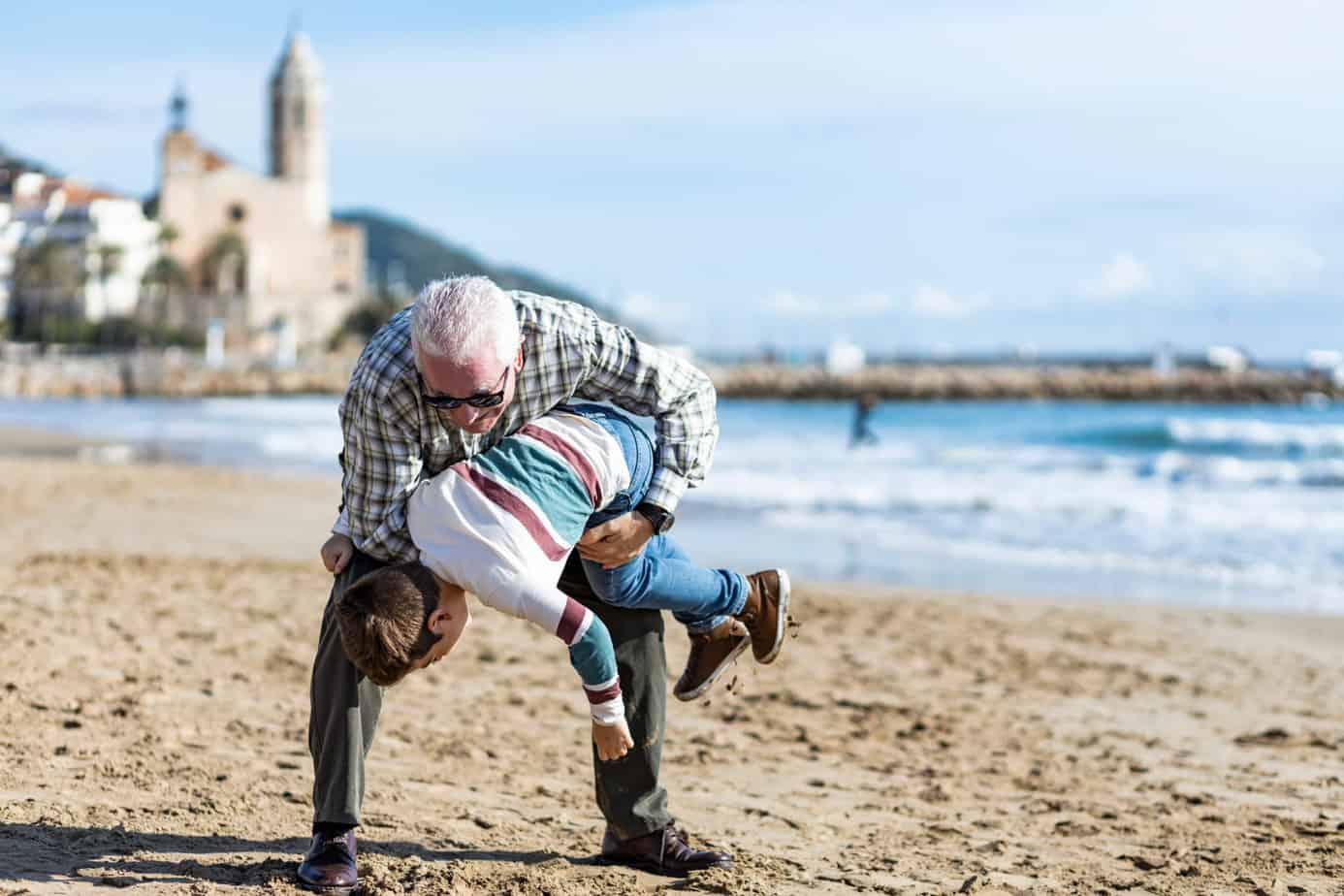 Grandfather Carrying Grandchild