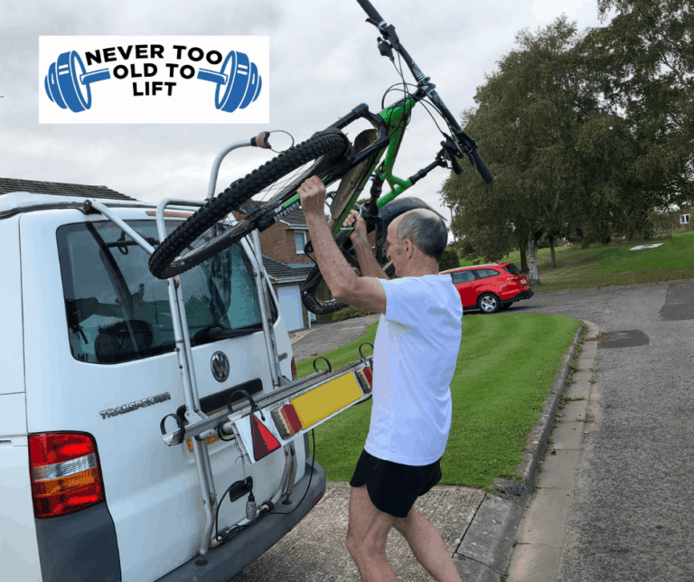 Mike Lifting Bike onto Van