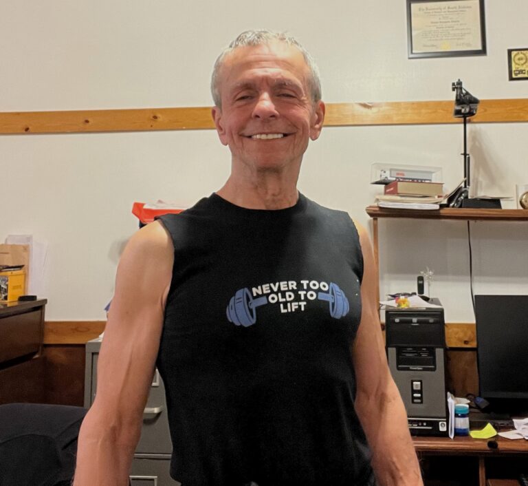 August in a Never Too Old to Lift top